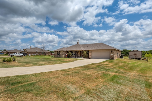 ranch-style house featuring a garage and a front lawn