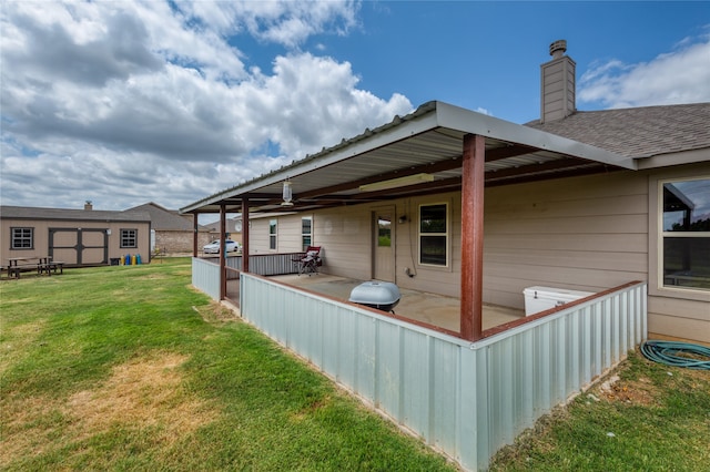 view of side of home with a lawn