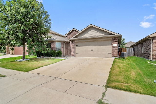 ranch-style home with a garage, cooling unit, and a front yard