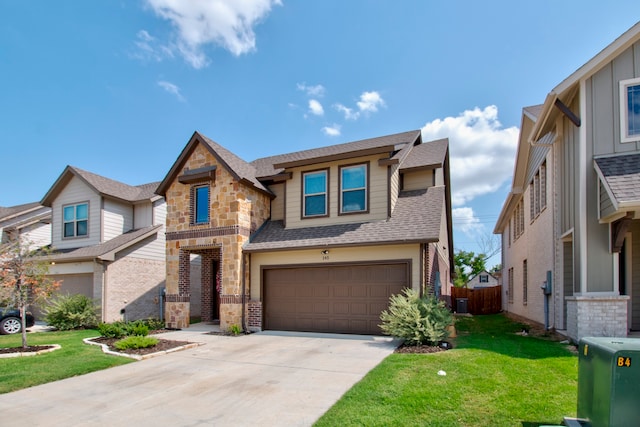 view of front of house featuring a garage and a front yard