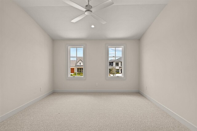 carpeted empty room with ceiling fan