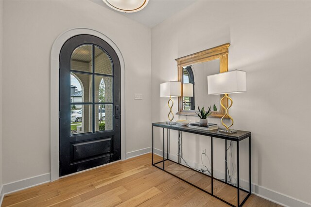 foyer entrance featuring hardwood / wood-style floors