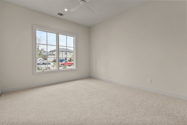 unfurnished room featuring carpet flooring and ceiling fan