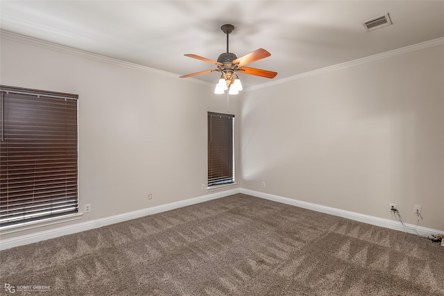 unfurnished room featuring ornamental molding, ceiling fan, and carpet flooring