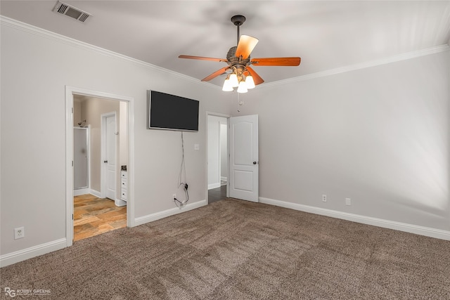 unfurnished bedroom with crown molding, ceiling fan, and carpet flooring