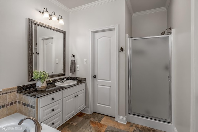 bathroom featuring ornamental molding, independent shower and bath, and vanity