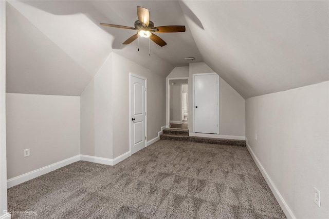 additional living space featuring lofted ceiling, carpet floors, and ceiling fan