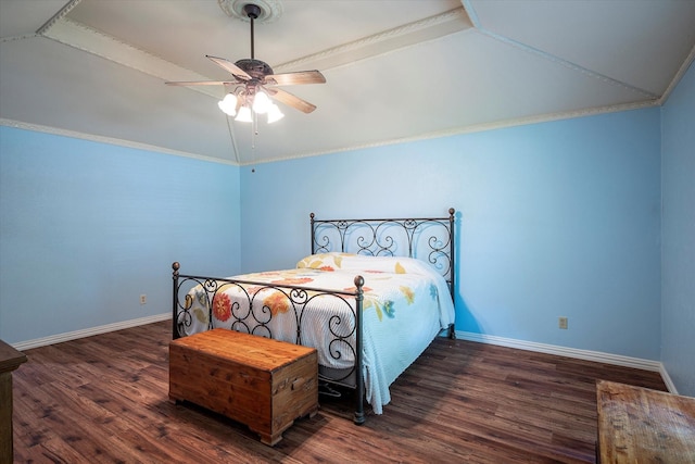 bedroom featuring dark hardwood / wood-style flooring, lofted ceiling, and ceiling fan