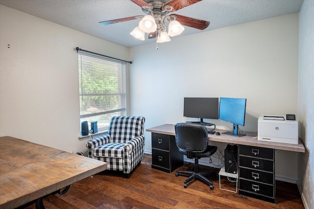 office space with dark hardwood / wood-style flooring, ceiling fan, and a textured ceiling