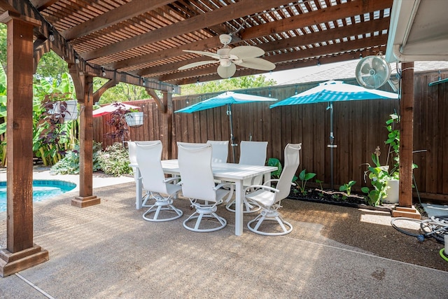 view of patio featuring a fenced in pool, a pergola, and ceiling fan