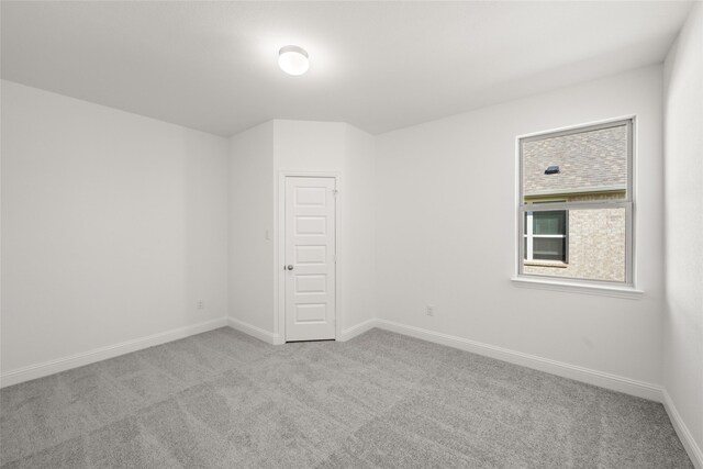 unfurnished room featuring light hardwood / wood-style floors and ceiling fan