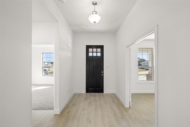 hall featuring light hardwood / wood-style floors