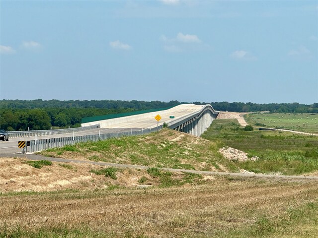 view of yard with a rural view