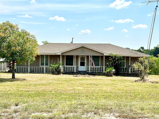 ranch-style house featuring a front lawn