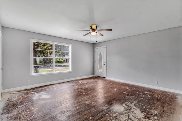 unfurnished room featuring hardwood / wood-style floors and ceiling fan