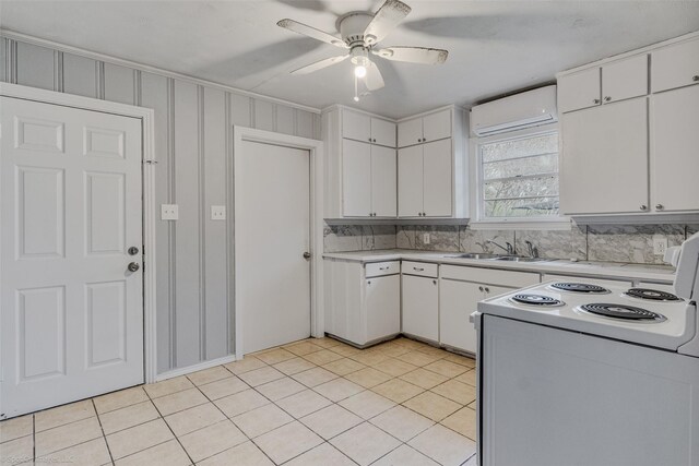 spare room featuring ceiling fan and light hardwood / wood-style floors