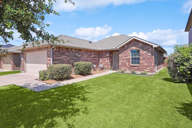 ranch-style home with a garage and a front lawn