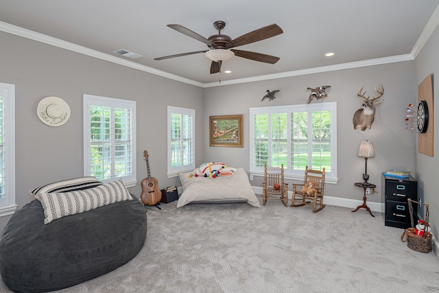 bedroom with carpet, ornamental molding, and ceiling fan