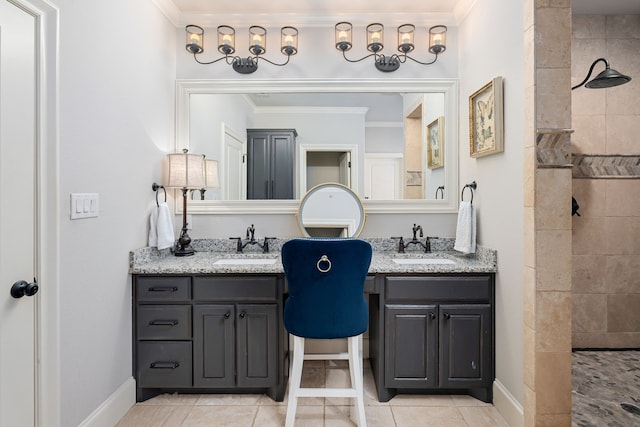 bathroom featuring walk in shower, two vanities, and a sink