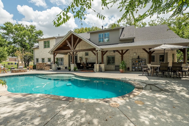 view of pool featuring a patio area, fence, and a fenced in pool