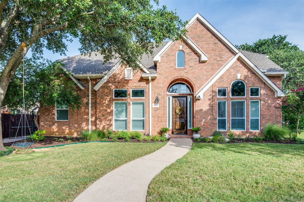 view of front property with a front lawn