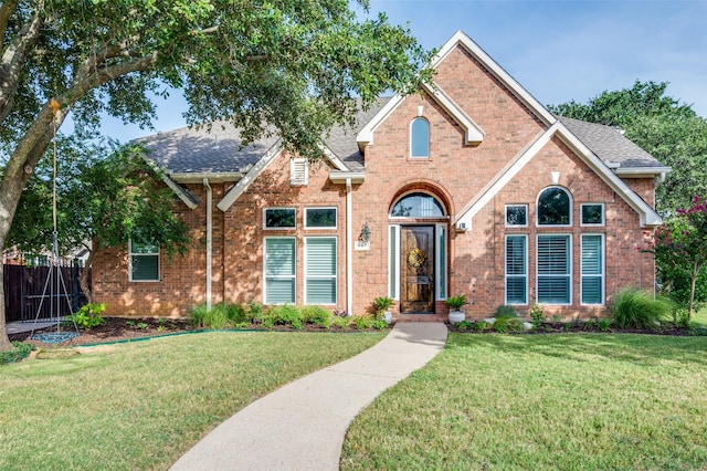 view of front property with a front lawn