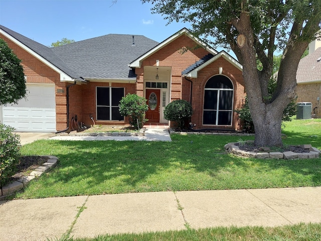 ranch-style house featuring a garage, a front lawn, and central AC