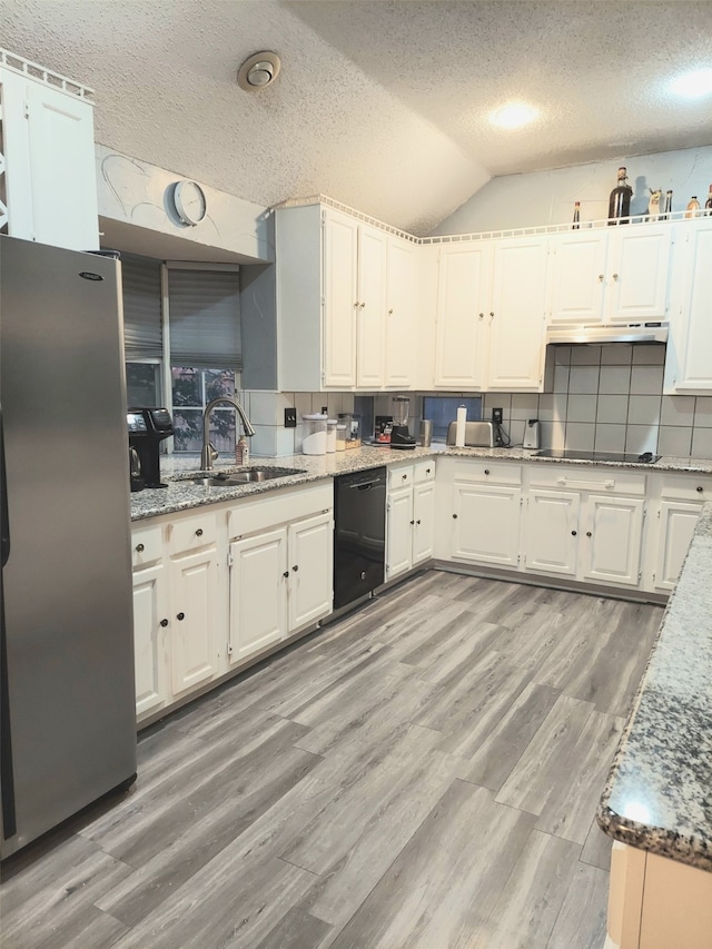 kitchen with stainless steel refrigerator, white cabinetry, light hardwood / wood-style floors, dishwasher, and sink