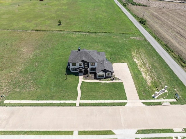 birds eye view of property featuring a rural view