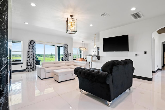 living room with light tile patterned floors