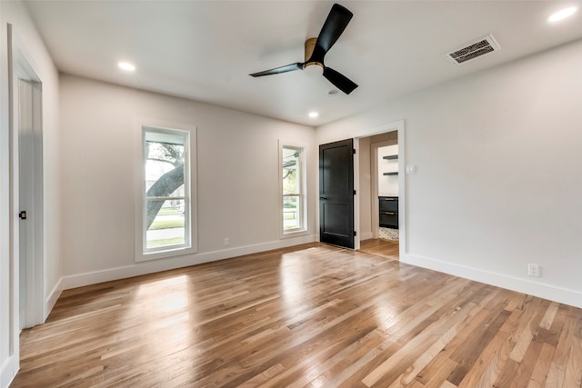 interior space featuring light wood-type flooring and ceiling fan