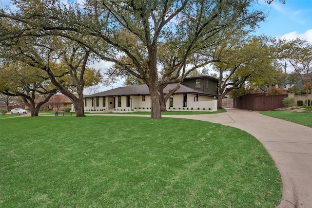 view of front of home with a front yard