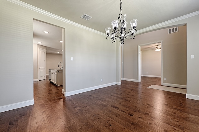 unfurnished room featuring ceiling fan with notable chandelier, dark hardwood / wood-style flooring, sink, and ornamental molding