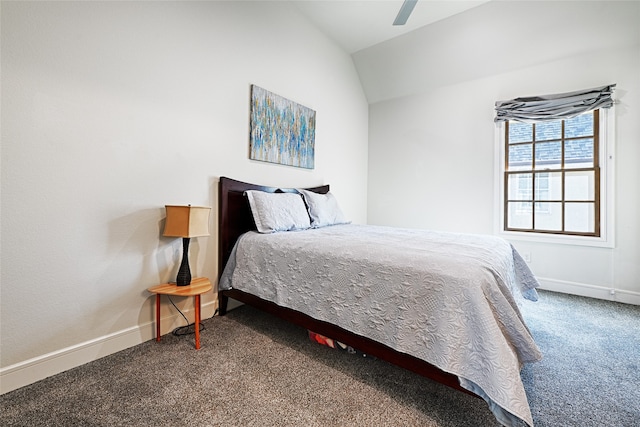 bedroom featuring vaulted ceiling, ceiling fan, and carpet flooring