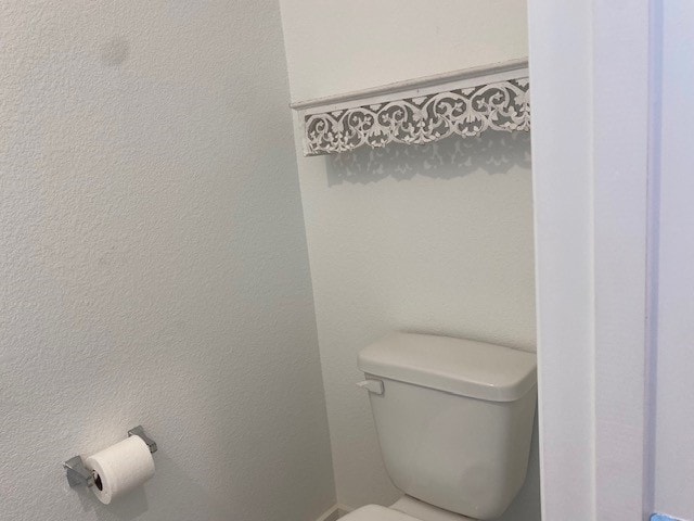 bathroom featuring toilet