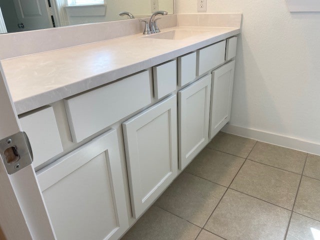 bathroom featuring vanity and tile patterned floors