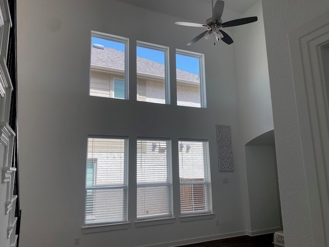 interior space featuring ceiling fan