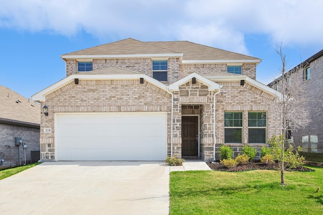 front of property featuring a front yard and a garage