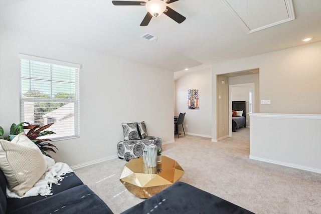 interior space featuring ceiling fan and light carpet