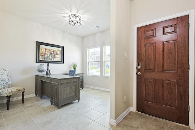 office space featuring light tile patterned floors