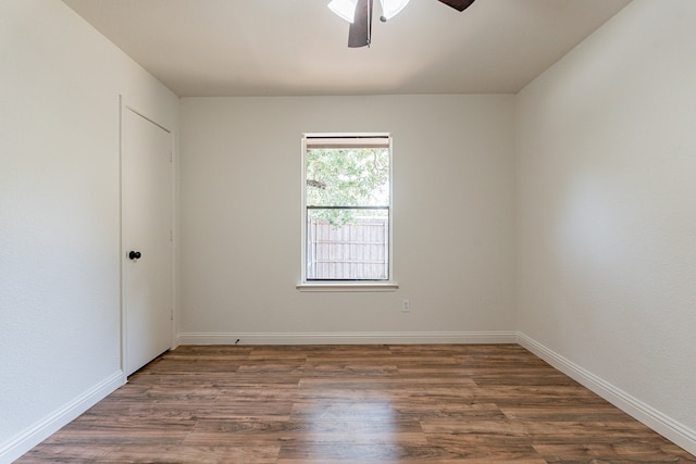 unfurnished room with wood-type flooring and ceiling fan