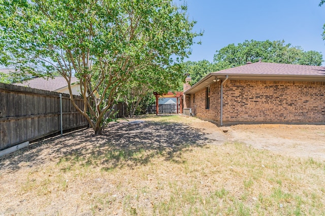 view of yard featuring a fenced backyard