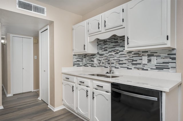4500 Larner St, The Colony, TX 75056 - kitchen featuring dishwasher, a sink, white cabinetry, and dark wood finished floors