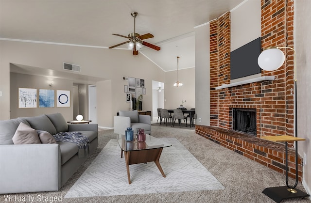 living room with a fireplace, high vaulted ceiling, ceiling fan, and light colored carpet