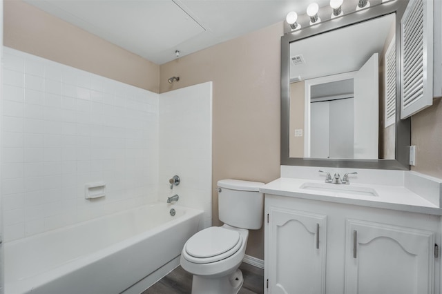 4500 Larner St, The Colony, TX 75056 - full bath featuring toilet, tub / shower combination, vanity, wood finished floors, and baseboards