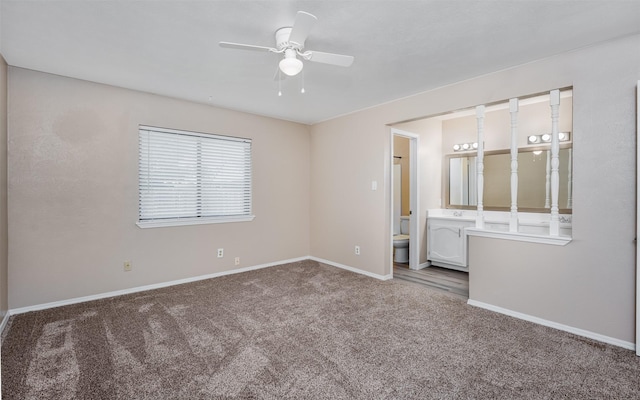 4500 Larner St, The Colony, TX 75056 - unfurnished bedroom featuring carpet, baseboards, ensuite bath, and a ceiling fan