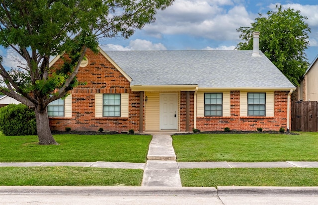 4500 Larner St, The Colony, TX 75056 - view of front of property with brick siding and a shingled roof