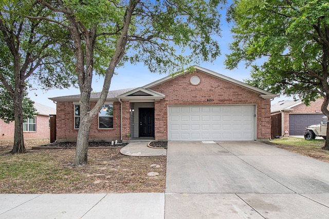 single story home with a garage