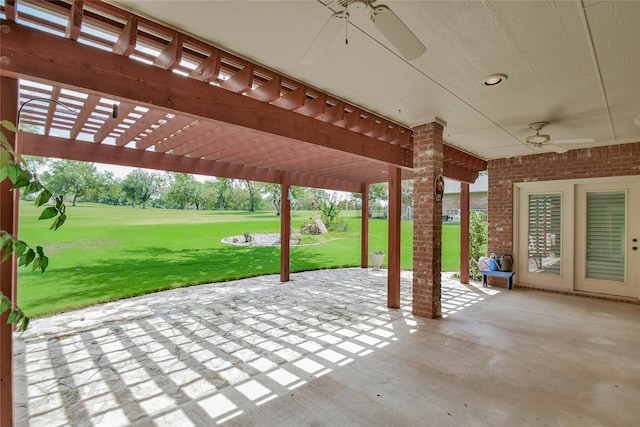 view of patio / terrace featuring ceiling fan and a pergola