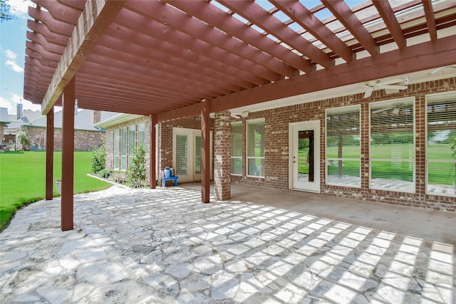 view of patio with ceiling fan and a pergola